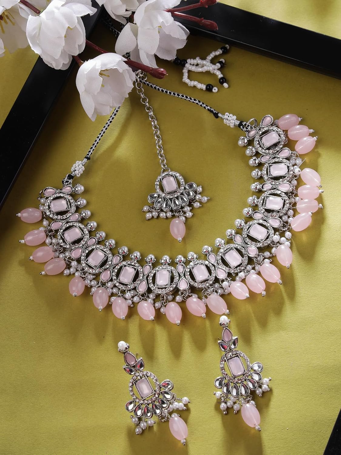 Sukkhi Artistic Rhodium Plated Pink AD Stone Collar Bone Necklace Set With Earring And Maangtika | Jewellery Set For Women (NS105698)