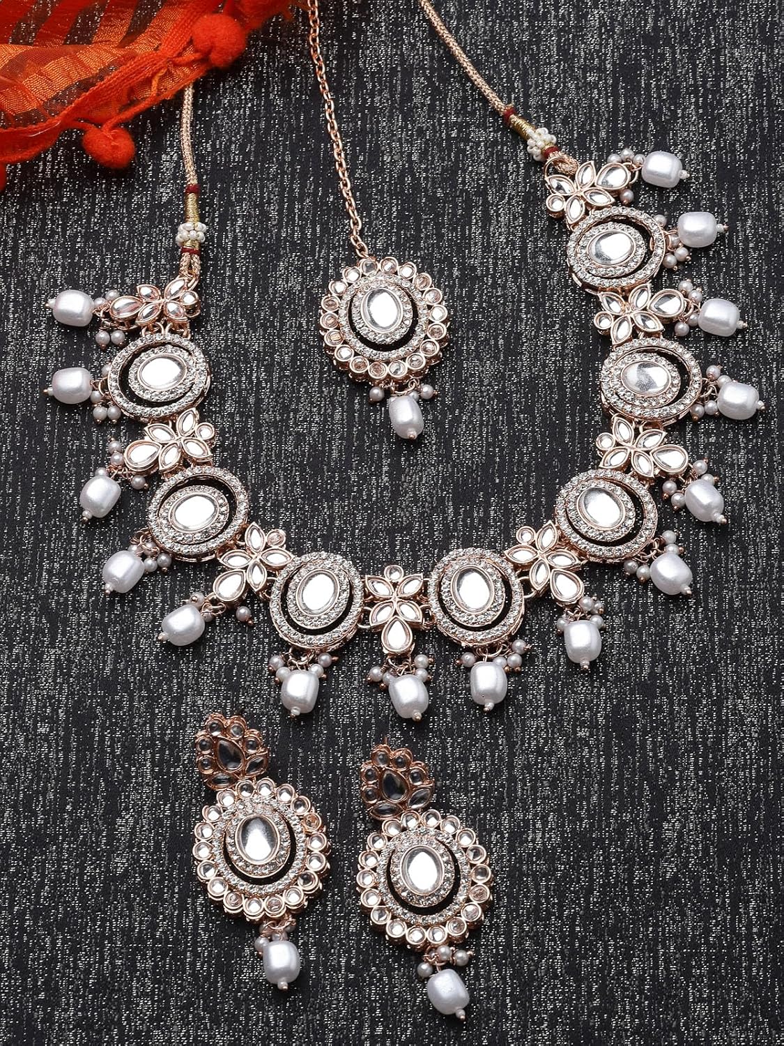 Sukkhi Traditional Gold Plated AD Stone Collar Bone Necklace Set With Earring And Maangtika | Jewellery Set For Women (NS105700)